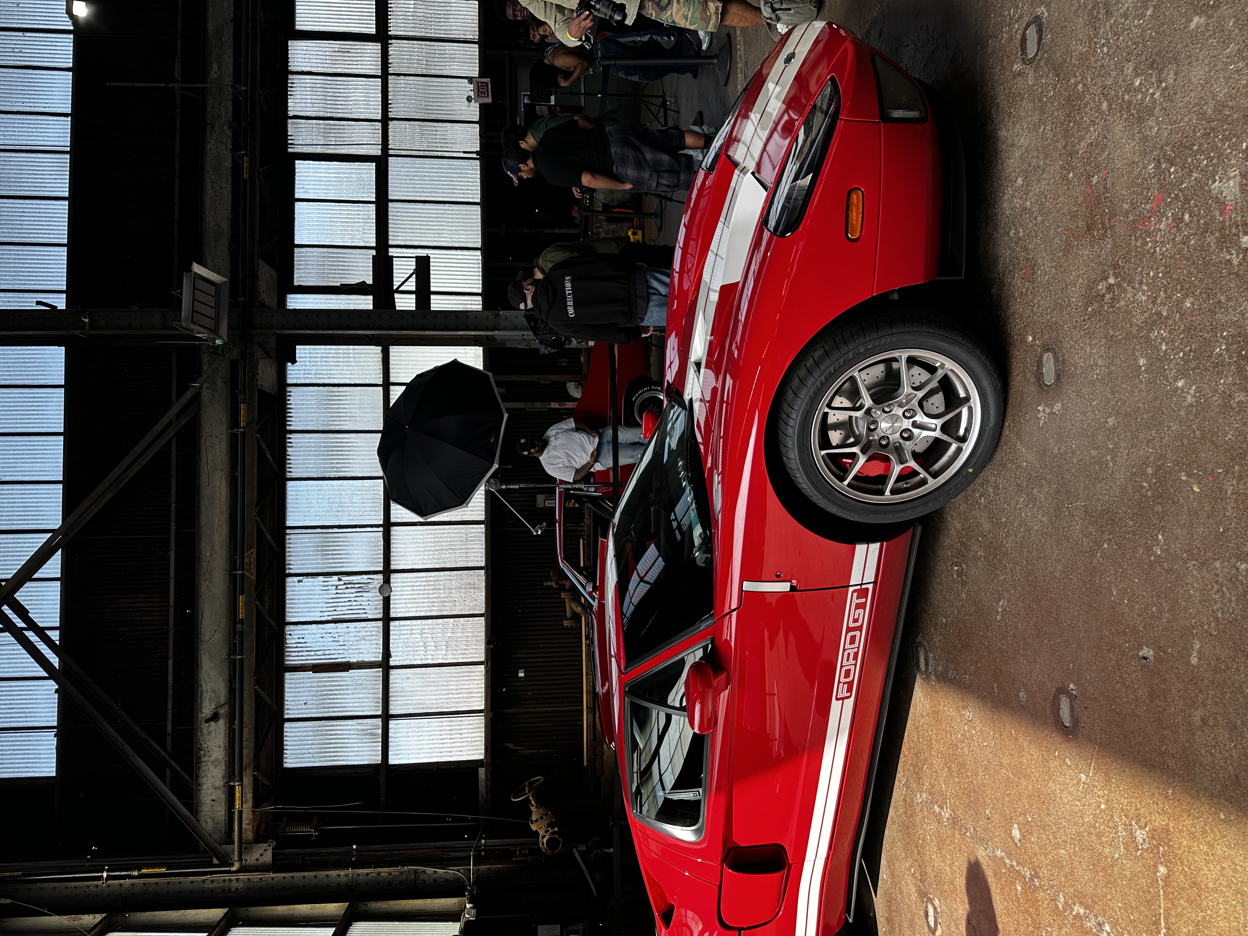 bright red ford gt with stripes