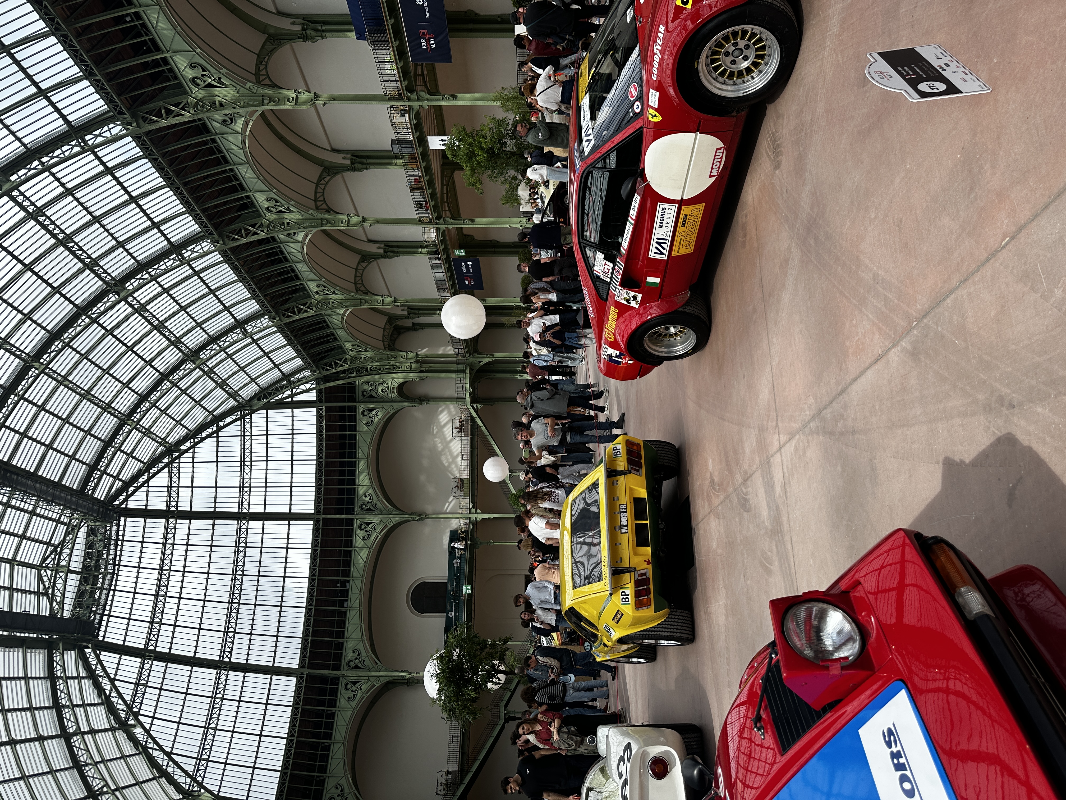 vintage cars in large well lit hall
